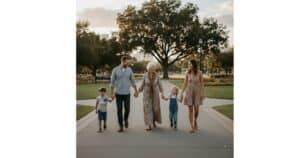 Three-generational family walking happily and in good relationship