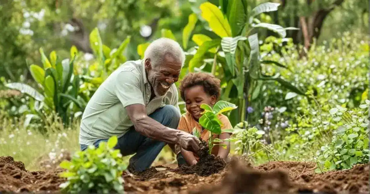 A photo of grandfather engaged in planting a plant with his grandchild, conveying mentorship and presence.